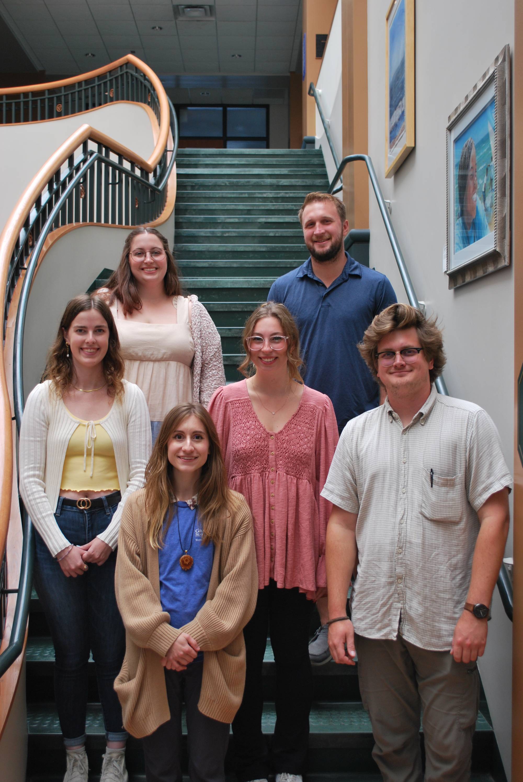 2023 Graduate Student Assistants standing on stairway of AWRI.